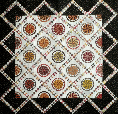 Twirly Balls and Pinwheels by Sue Garman. (image TheQuiltShow.com)