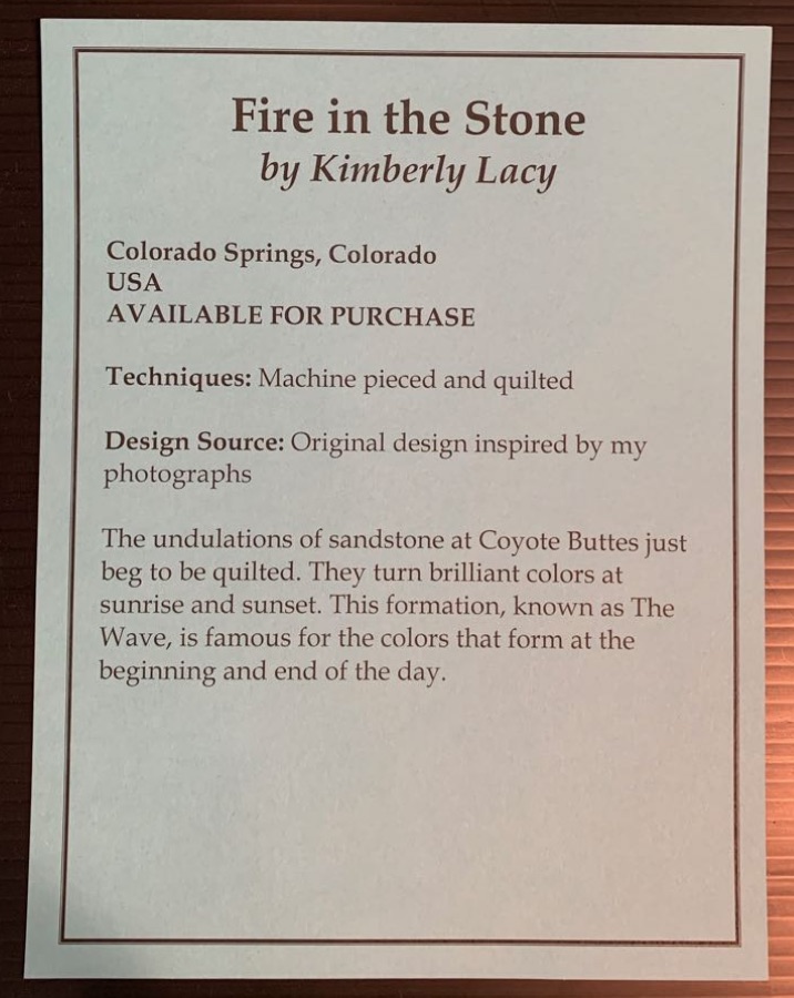 "Fire in the Stone" by Kimberly Lacy - Sign