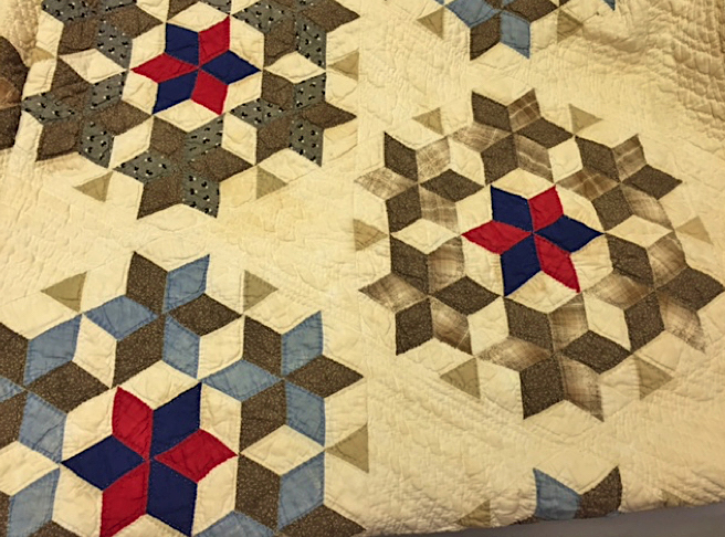 Seven Sisters quilt c 1890 made either by Christianna Elizabeth "Annie" Bradley Taylor or her daughter Mattye Mae Taylor. Gift of Mr. and Mrs. Bobby Joe Moody (Charlotte Lamb), TTU-H2016-020-002